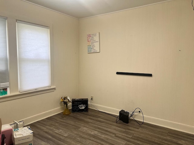 14701 E Riverside Dr, South Holland, IL 60473 - spare room featuring dark wood finished floors, baseboards, and ornamental molding