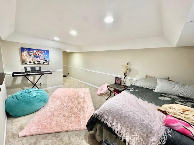 bedroom with recessed lighting, carpet, baseboards, and a raised ceiling