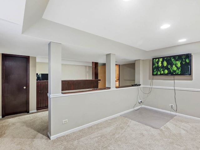 finished basement featuring recessed lighting, baseboards, and carpet floors