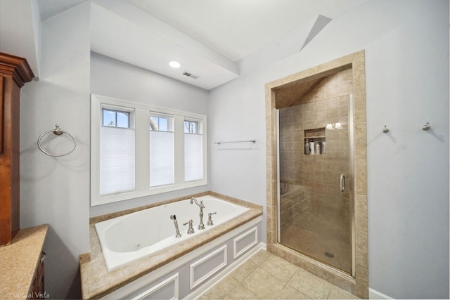 full bathroom with a whirlpool tub, a shower stall, visible vents, and tile patterned flooring