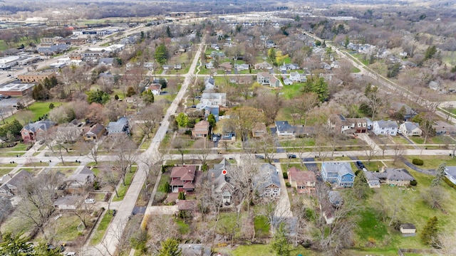 birds eye view of property with a residential view