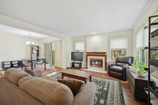 2806 Brindle Ct, Northbrook, IL 60062 - living area with dark wood-style flooring, a fireplace, a chandelier, and recessed lighting