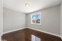 unfurnished room featuring baseboards