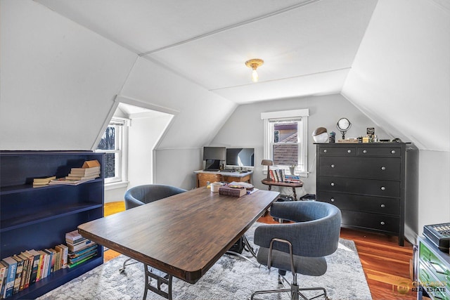 home office featuring wood finished floors and lofted ceiling