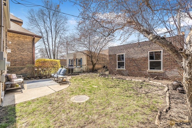 view of yard with a patio area