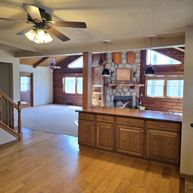 5491 S Koch Rd, Pearl City, IL 61062 - unfurnished living room with carpet flooring, wood ceiling, rustic walls, and beamed ceiling