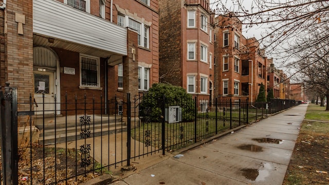 exterior space with a fenced front yard