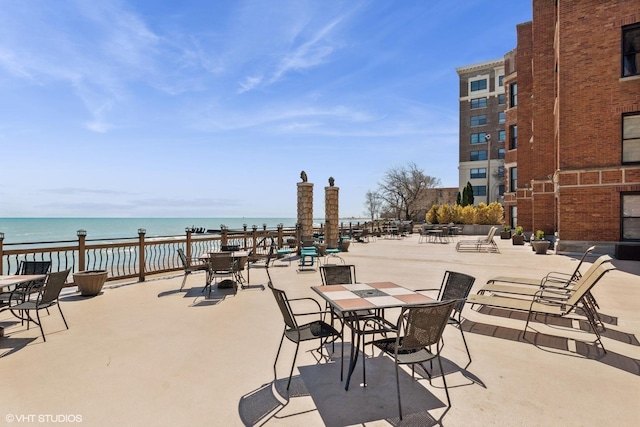view of patio / terrace with a water view