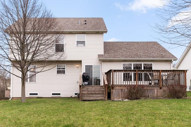 back of house featuring a lawn, crawl space, a deck, and a shingled roof