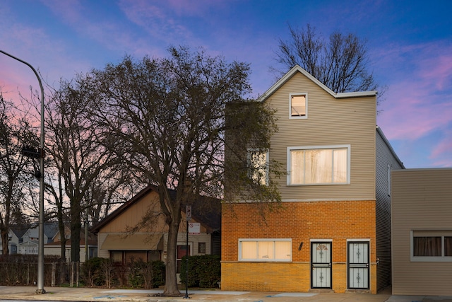view of front of property with brick siding