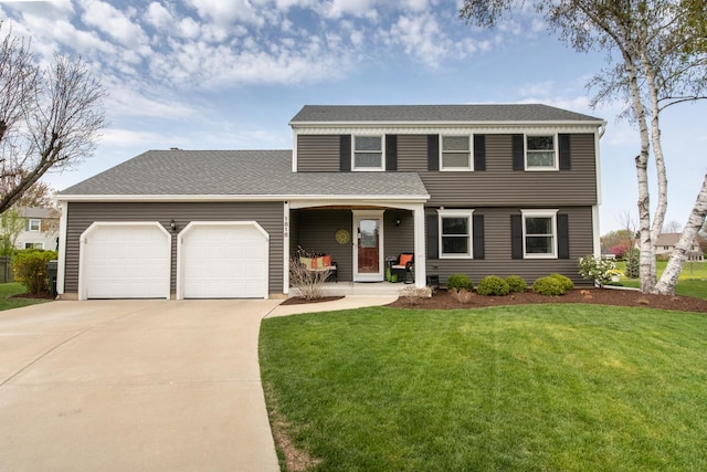 traditional-style house with driveway, a shingled roof, a front yard, and a garage