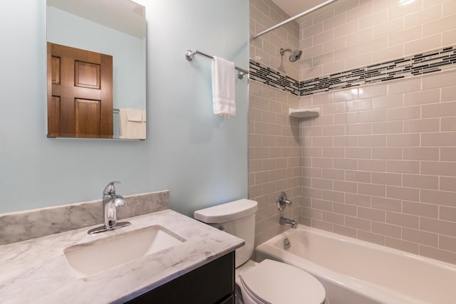 full bath with washtub / shower combination, vanity, and toilet