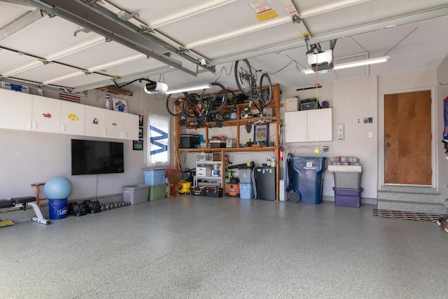 garage featuring a garage door opener
