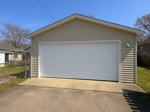 detached garage with fence