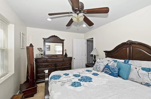 bedroom featuring light carpet, ceiling fan, and recessed lighting