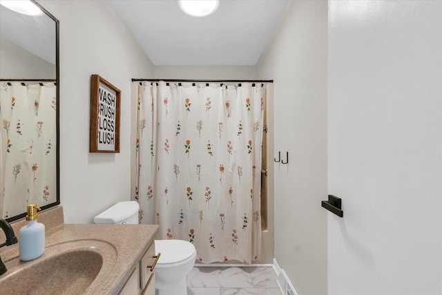 415 E 14th St, Gibson City, IL 60936 - bathroom with shower / bath combo, vanity, marble finish floor, baseboards, and toilet