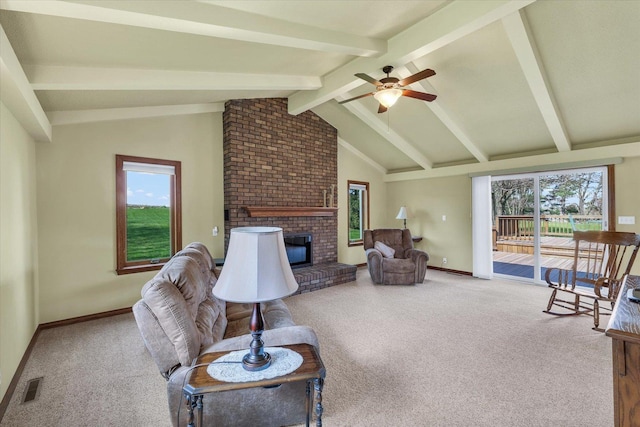 2 Woodland Dr, White Heath, IL 61884 - carpeted living area with ceiling fan, a brick fireplace, plenty of natural light, and baseboards