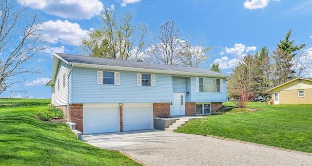 2 Woodland Dr, White Heath, IL 61884 - raised ranch with a garage, concrete driveway, a front yard, and brick siding
