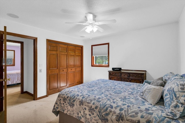 2 Woodland Dr, White Heath, IL 61884 - bedroom featuring carpet flooring, baseboards, a closet, and ceiling fan