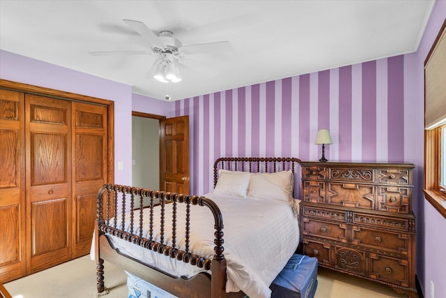 2 Woodland Dr, White Heath, IL 61884 - bedroom featuring light colored carpet, ceiling fan, wallpapered walls, and a closet