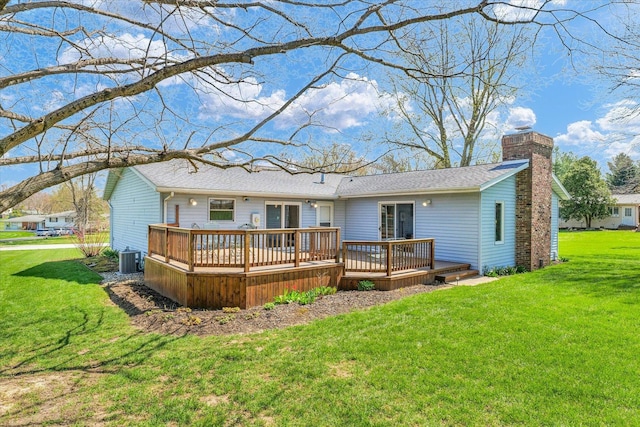2 Woodland Dr, White Heath, IL 61884 - back of house with a deck, a chimney, a lawn, and central air condition unit