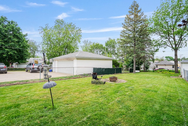 918 Dawes Ave, Joliet, IL 60435 - view of yard featuring an outdoor fire pit and a detached garage