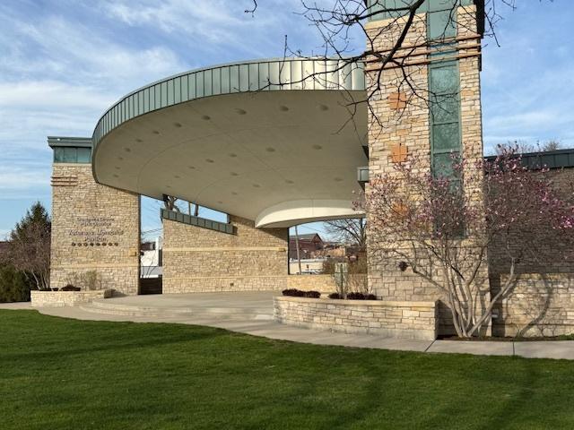 view of community featuring a lawn