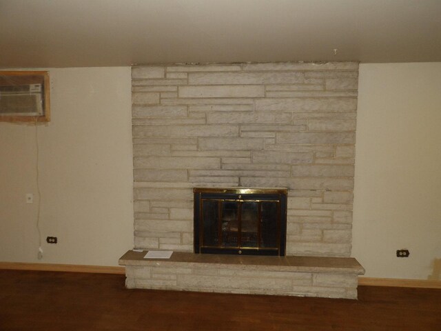 16315 Kenwood Ave, South Holland, IL 60473 - interior details with baseboards, wood finished floors, a fireplace, and a wall mounted AC