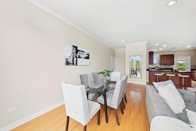 3443 N Lincoln Ave Unit 4A, Chicago, IL 60657 - dining area featuring plenty of natural light, light wood-type flooring, crown molding, recessed lighting, and baseboards