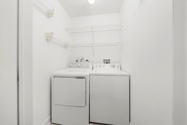 3443 N Lincoln Ave Unit 4A, Chicago, IL 60657 - washroom with washing machine and clothes dryer