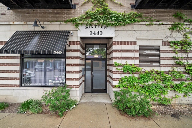 3443 N Lincoln Ave Unit 4A, Chicago, IL 60657 - property entrance with brick siding