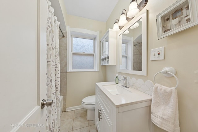 full bathroom featuring toilet, tile patterned floors, vanity, and a shower with shower curtain
