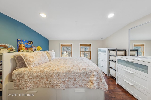 bedroom with recessed lighting, vaulted ceiling, and dark wood-style floors