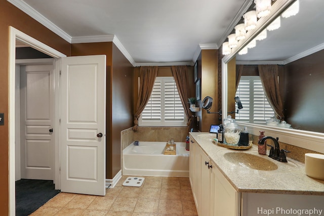 bathroom featuring a bath, vanity, and crown molding