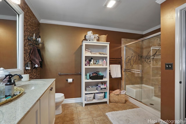 full bathroom featuring toilet, a stall shower, vanity, and ornamental molding