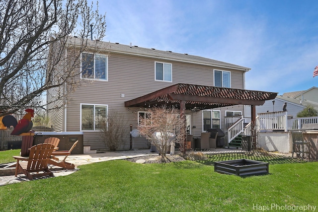 back of property with a pergola, a patio area, a jacuzzi, and a lawn