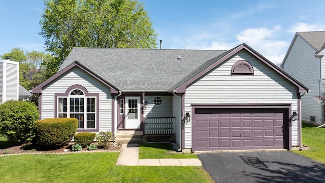 ranch-style home featuring asphalt driveway, a front yard, a garage, and roof with shingles