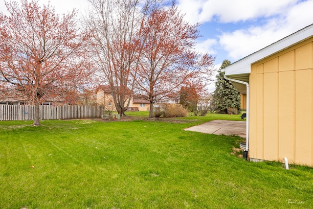 view of yard featuring a patio area and fence