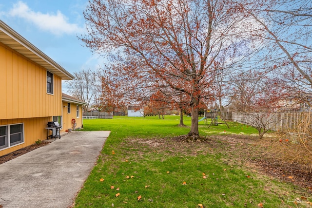 view of yard with a patio area and fence