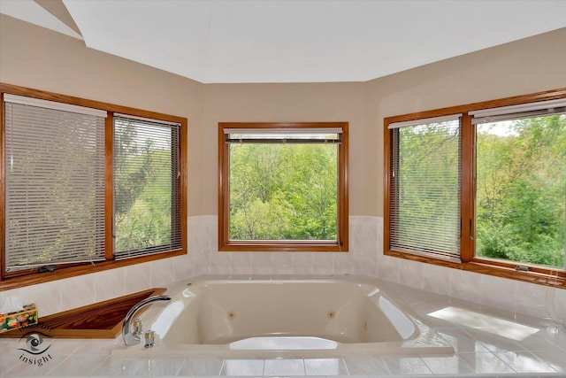 bathroom with a jetted tub