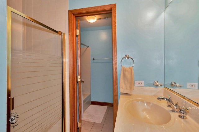 bathroom with an enclosed shower, tile patterned flooring, vanity, and a bath