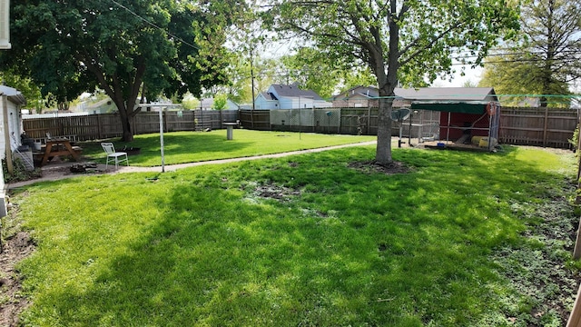 view of yard featuring a fenced backyard