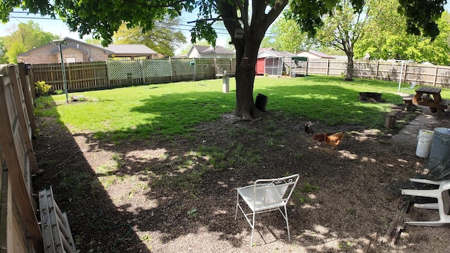 view of yard with a fenced backyard