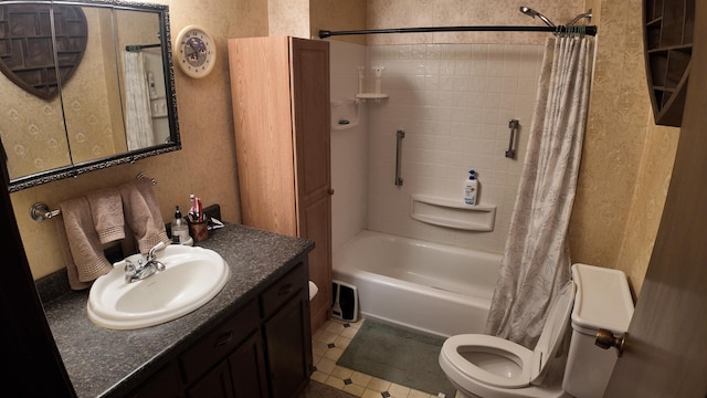 bathroom featuring vanity, toilet, and shower / tub combo with curtain