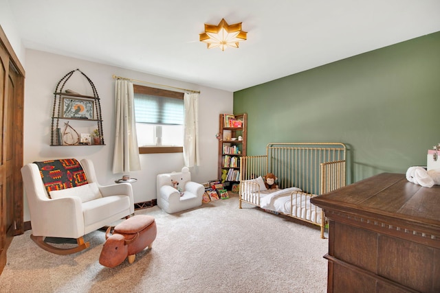 carpeted bedroom with a closet