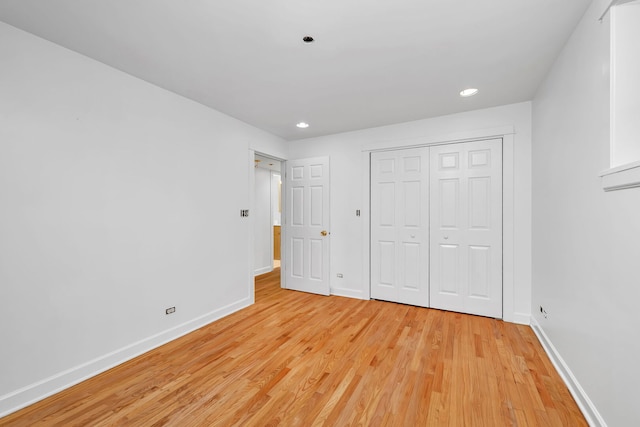 5014 N Oakley Ave Unit G, Chicago, IL 60625 - unfurnished bedroom with a closet, baseboards, light wood finished floors, and recessed lighting
