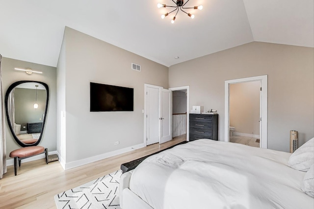 bedroom featuring baseboards, an inviting chandelier, light wood-type flooring, vaulted ceiling, and visible vents
