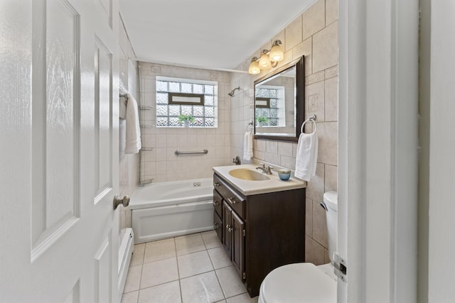 2336 Union St Unit 3, Blue Island, IL 60406 - full bathroom featuring a baseboard heating unit, toilet, tile walls, tile patterned floors, and shower / washtub combination