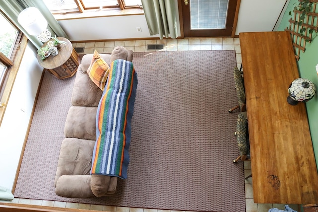 interior space with visible vents and tile patterned floors