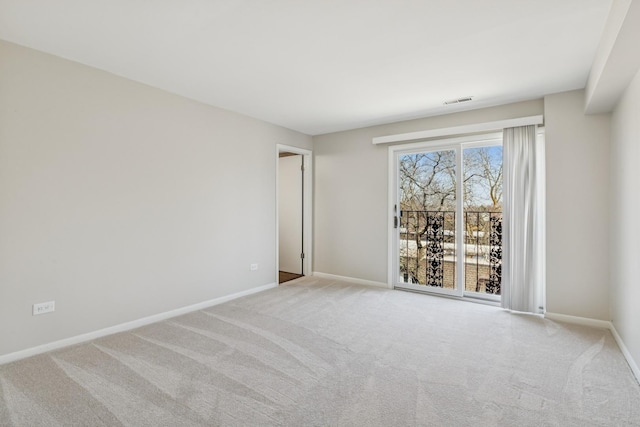 1927 Tanglewood Dr Unit 4A, Glenview, IL 60025 - carpeted spare room with visible vents and baseboards